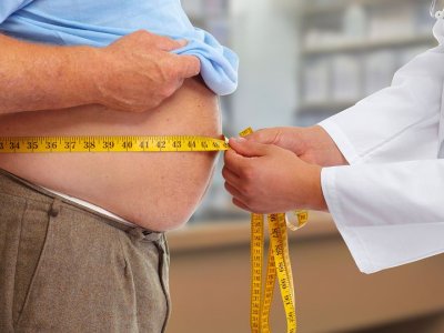 bigstock Doctor measuring obese man wai 111682115