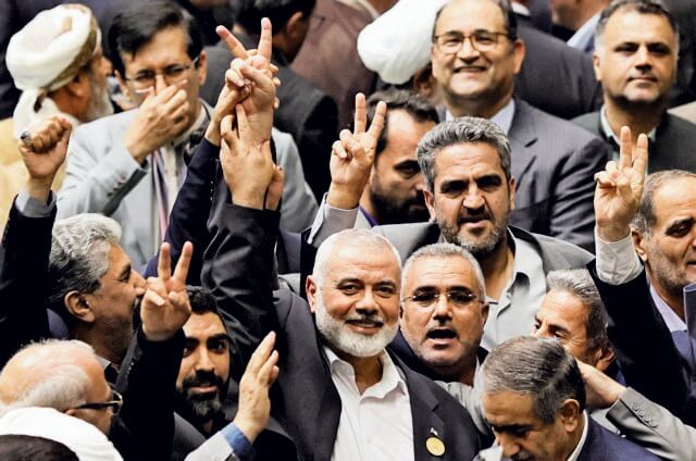 Palestinian group Hamas' top leader Ismail Haniyeh attends Iran's new President, Masoud Pezeshkian's swearing-in ceremony at the parliament in Tehran