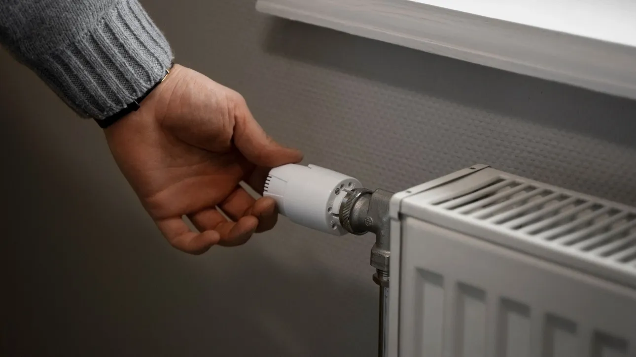 fd50cbb8-man-turning-off-radiator-energy-crisis