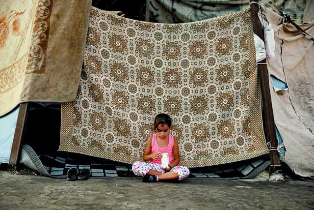 Displaced families shelter amid ongoing conflict, in Beirut