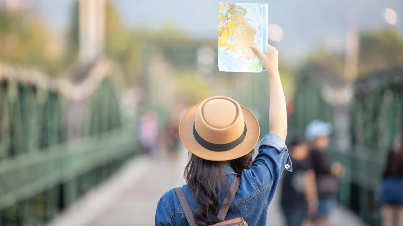 female-tourists-hand-have-happy-travel-map