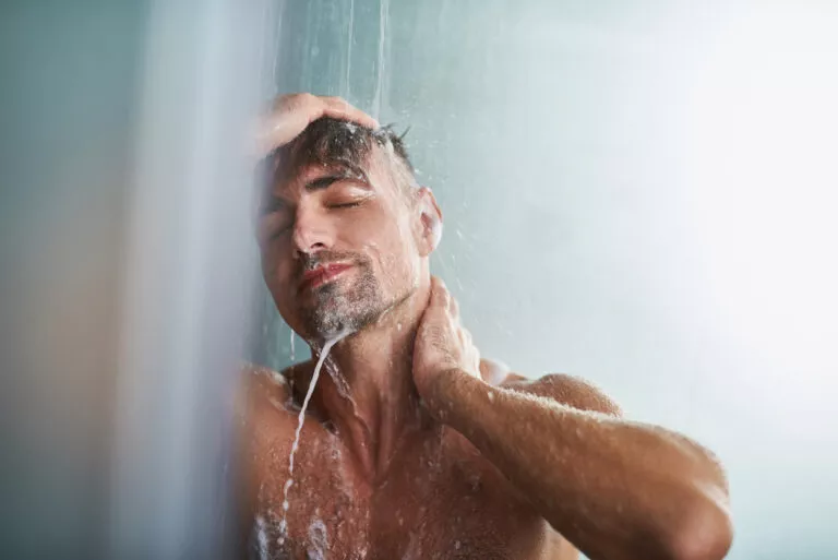 man_shower_iStock-1129831156-768x513