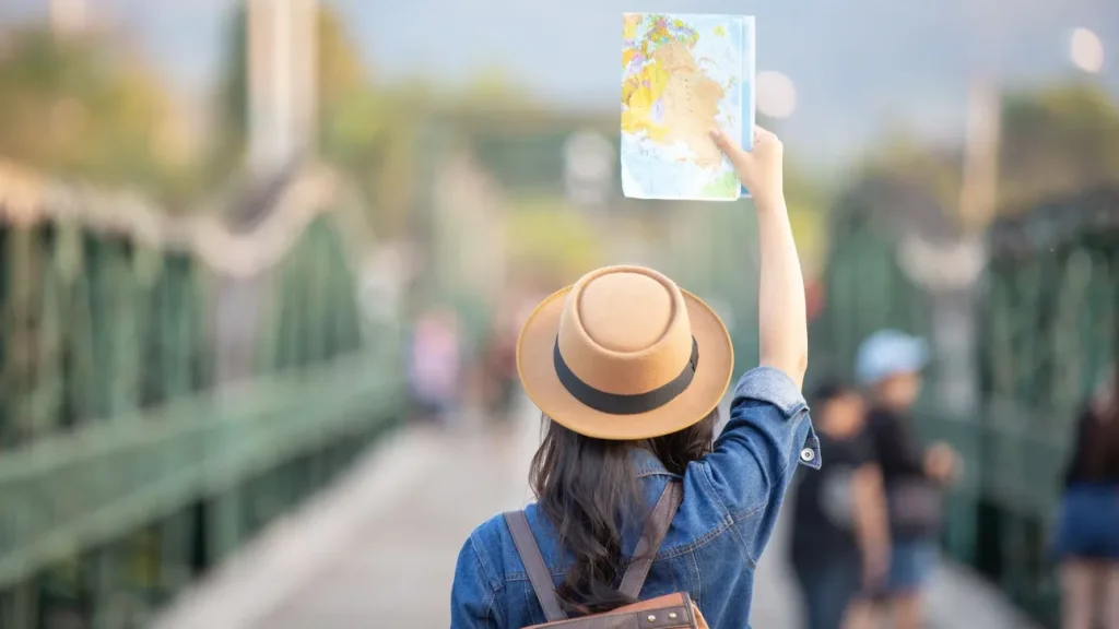 female-tourists-hand-have-happy-travel-map